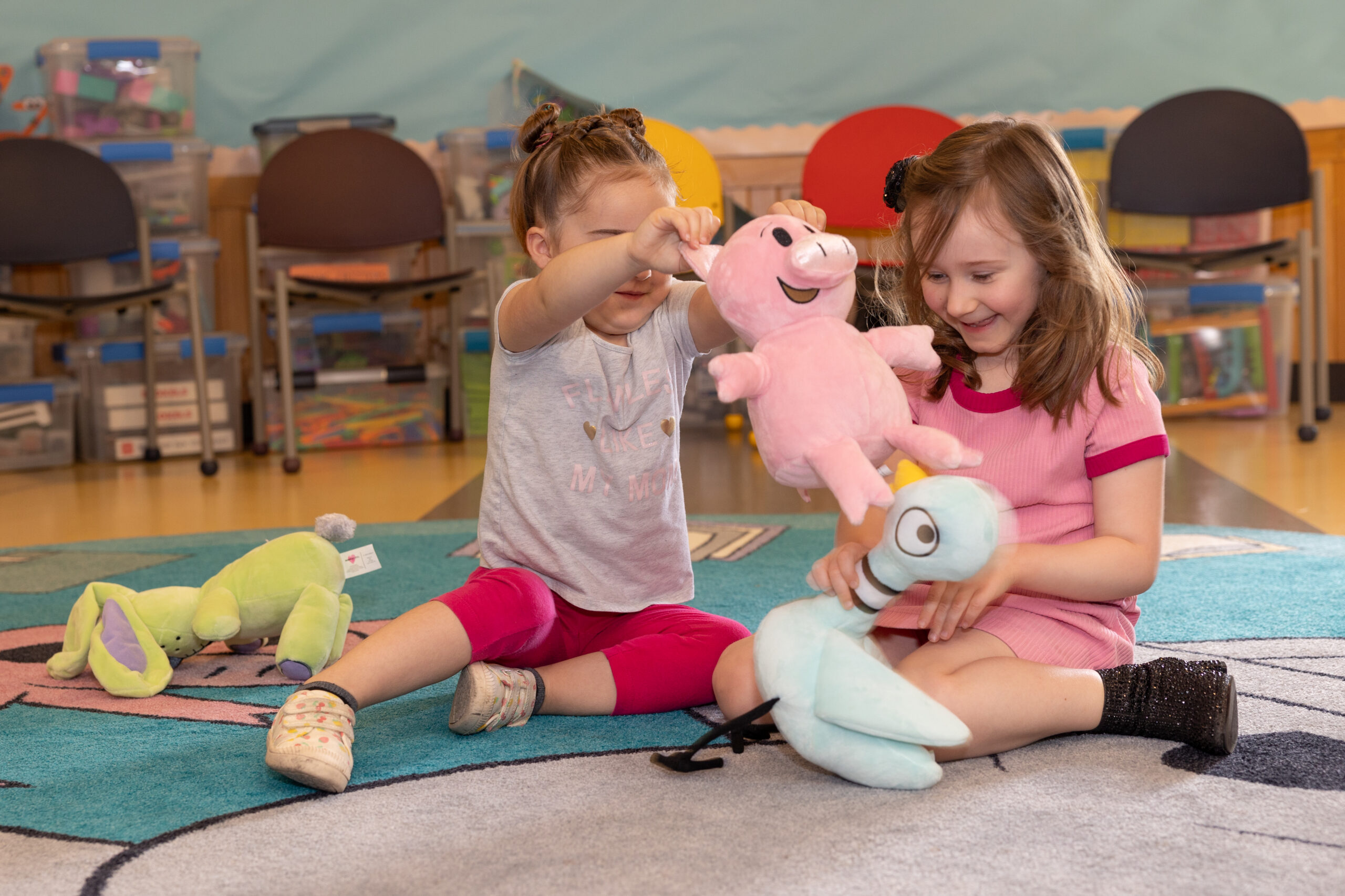 Two children playing with Mo Willems Toys Elephant and Pigge